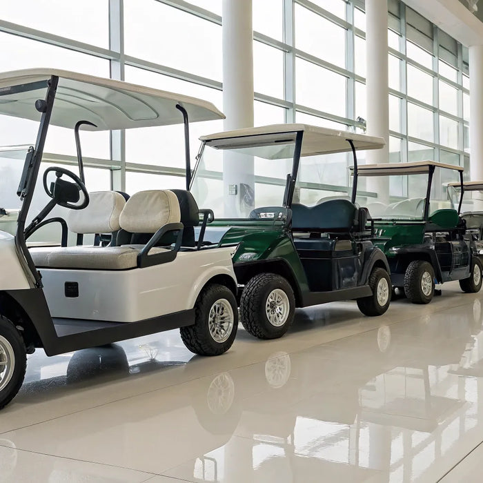 Several 6-seater street legal golf carts for sale in a dealership.