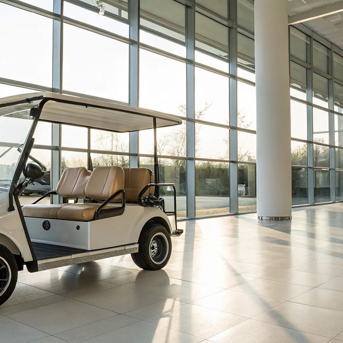 Luxury golf carts for sale in a showroom, featuring premium seating and sleek designs.
