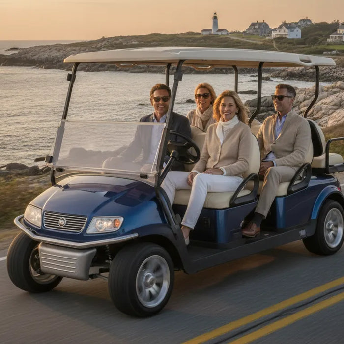 Luxury 6 seater golf cart traveling along a scenic New England coast