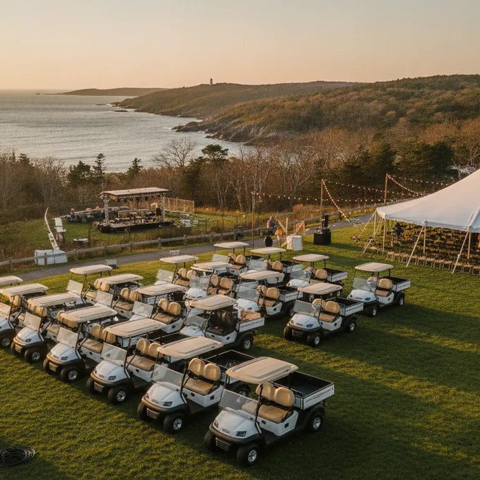 Golf cart rental fleet staged beside a New England outdoor event venue