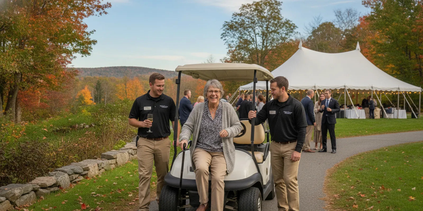 Guest using a golf cart beside an outdoor event venue path
