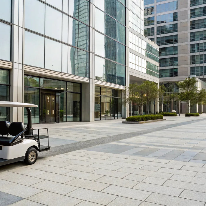 The cost of a new street legal golf cart parked on a city street.