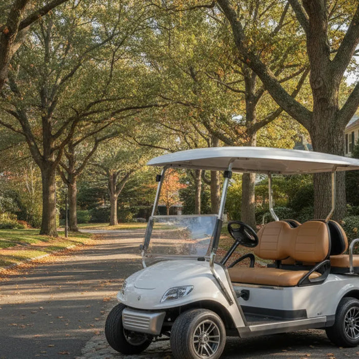 Four-seat electric golf cart parked on a quiet New England neighborhood lane