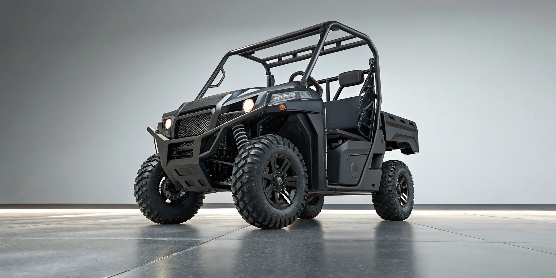 Black Realtree UT400 RT gas utility vehicle with rugged tires and an open cab.
