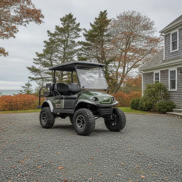 Lifted golf cart on a New England gravel drive