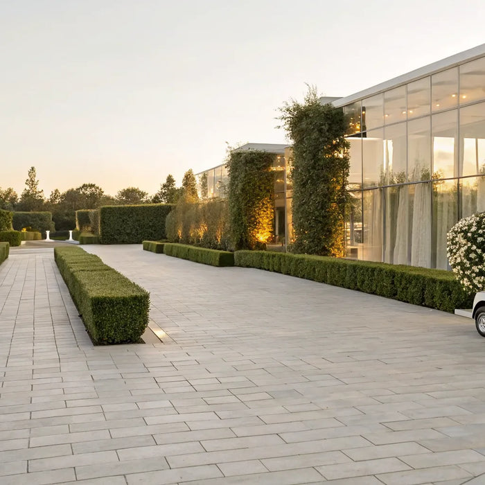 Wedding golf cart rental parked at an elegant outdoor venue.