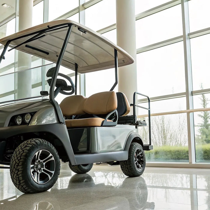 New Club Car golf cart for sale parked inside a bright dealership showroom.